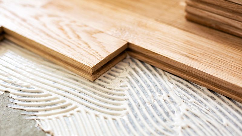 Photo de pose de parquet collé